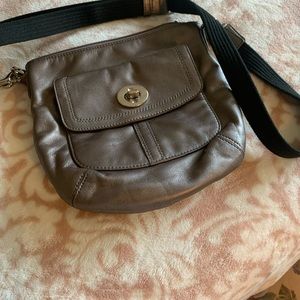 Very cute small Coach crossbody bag.
